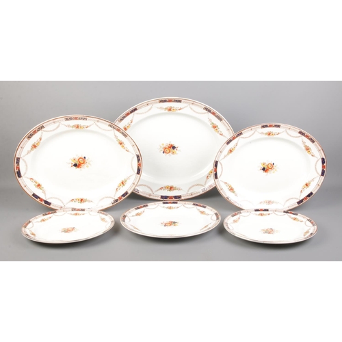 121 - A Coronaware Alexandra dinner set (approximately fifty pieces), comprising of dinner, salad and tea ... 