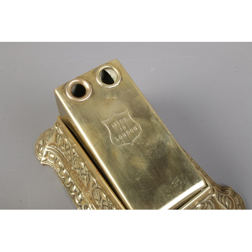 123 - Brass desktop cigar cutter in Art Nouveau style with 