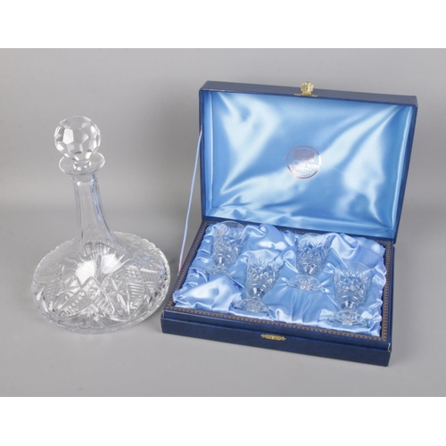 132 - A boxed Thomas Webb crystal glass set along with an unnamed cut glass decanter.