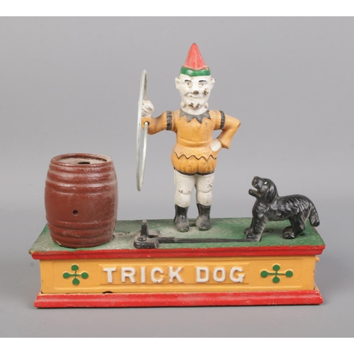 136 - A cast iron Trick Dog money box.