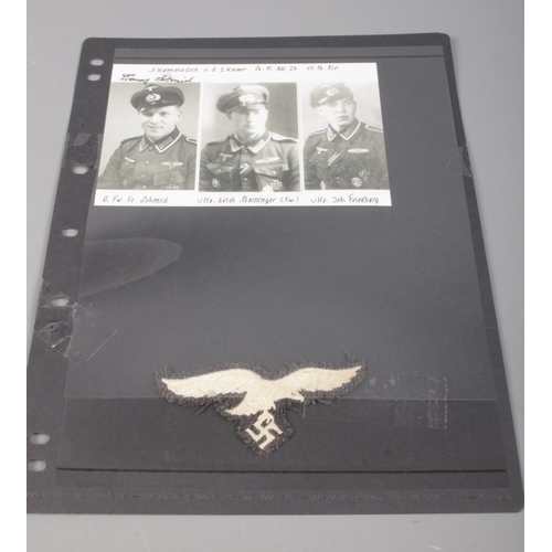 156 - A German Luftwaffe WWII pilot badge together with a signed pilot photograph.