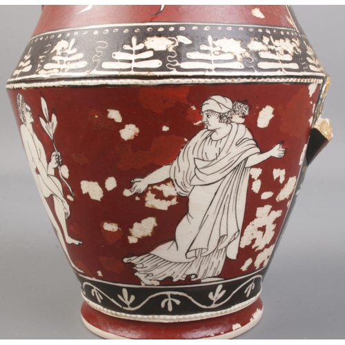 159 - A Greek jug decorated with classical figures and having mask spout. Label to base 'Neopolitan Count ... 