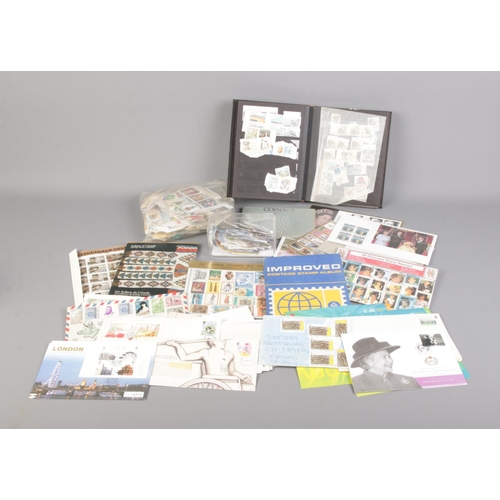 201 - A box of world stamps, most loose, including first day covers, presentation packs, Indians of Canada... 