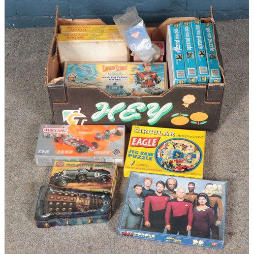 210 - A collection of children's toys and games including Waddington's Dan Dare jigsaw puzzles, Meccano, A... 