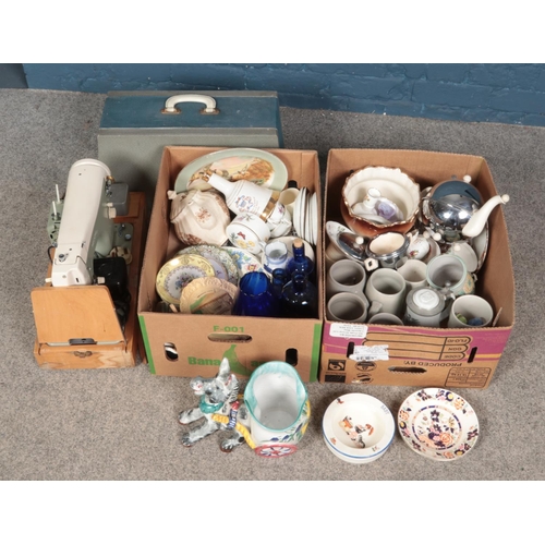 215 - Two boxes of miscellaneous along with a cased Necchi Lelia 510 sewing machine. Includes Masons, Wedg... 