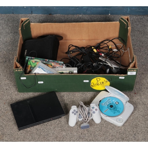 221 - A box of game consoles including Playstation one and two along with small quantity of games and port... 