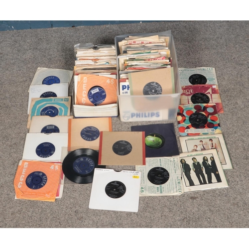 228 - Two boxes of The Beatles and The Rolling Stones single records.