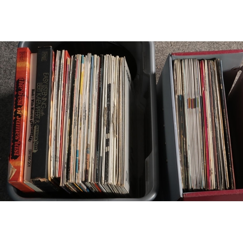 230 - Two boxes and one carry case of assorted records and singles including Wham, Bread, The Who, etc.