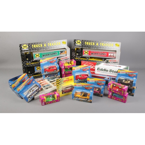 234 - A collection of diecast vehicles to include Super Racer, Bump and Go and Morrisons lorries.