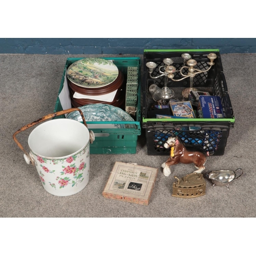 240 - Two boxes of miscellaneous to include silver plate, jigsaws, china tea service, etc.