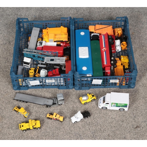 276 - Two trays of assorted diecast vehicles including modern commercial vehicles, trucks, etc.