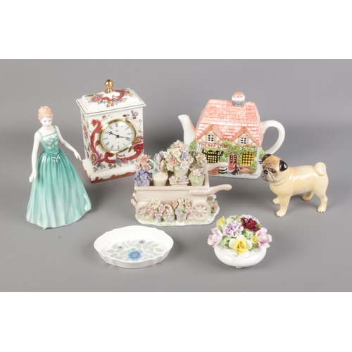 36 - A collection of various ceramics to include a Mason's mantel clock, Sylvac pug and other Royal Doult... 