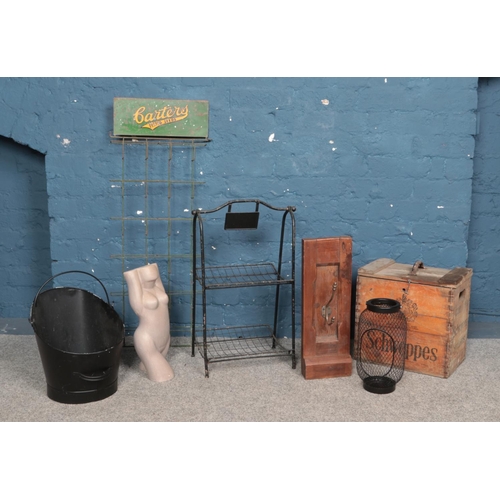 322 - A collection of industrial items and shop fittings. To include 'Carters Tested Seeds' stand, two tie... 