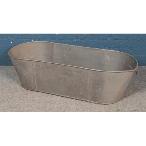 336 - Metal galvanised bath tub.

124cm long