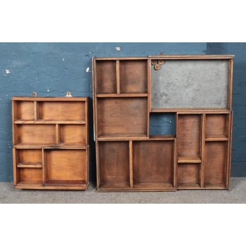 353 - Two wooden hanging industrial shelving units, purportedly by Elphius Flux, Chesterfield. Largest exa... 