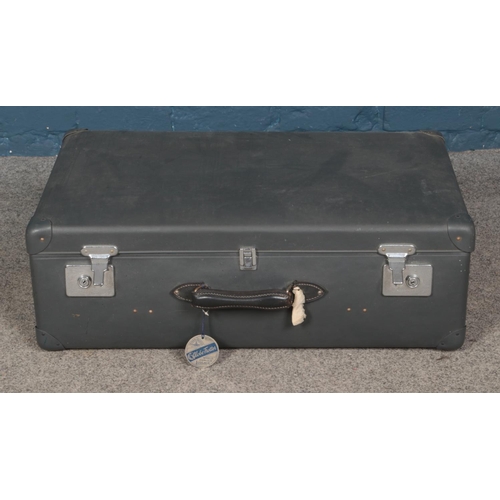 373 - A large Globe Trotter suitcase. Approx. dimensions 76cm x 45cm.