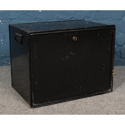 393 - A lockable metal trunk, bearing label for 'Jones Brothers, Wolverhampton'. With key. Height: 36cm, W... 