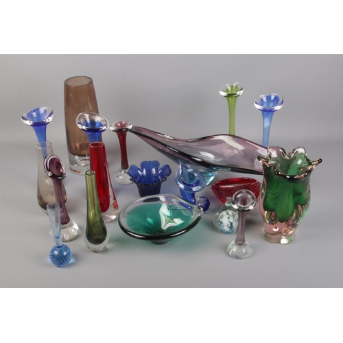 73 - A collection of Aseda glass bone vases and other coloured glassware