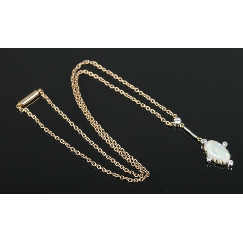 451 - An antique opal and diamond pendant necklet, with diamonds set in platinum. Tests to high carat gold... 