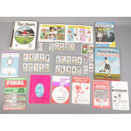 81 - A quantity of football ephemera. Includes cigarette cards, 1960s football programmes, 'The Hornet' T... 