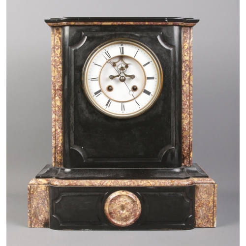 90 - A black slate and marble mantel clock, with O. Berger movement on white enamel dial and Roman Numera... 