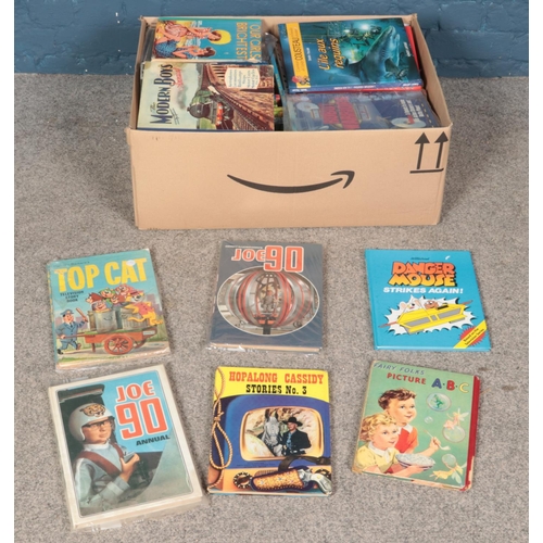 598 - Large box of boys annuals including Joe 90, Danger Mouse, Top Cat and Hopalong Cassidy.