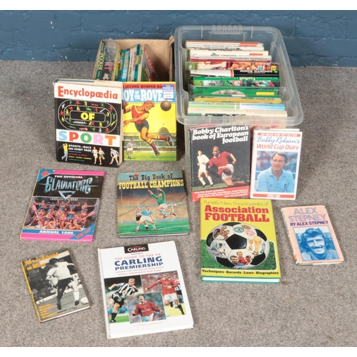 605 - Two boxes of sporting annuals and books. Includes mostly football, George Best Soccer Annual, etc.