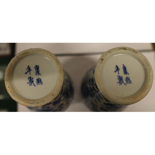 7 - A collection of blue and white ceramics to include tulip vase and pair of baluster lidded vase beari... 