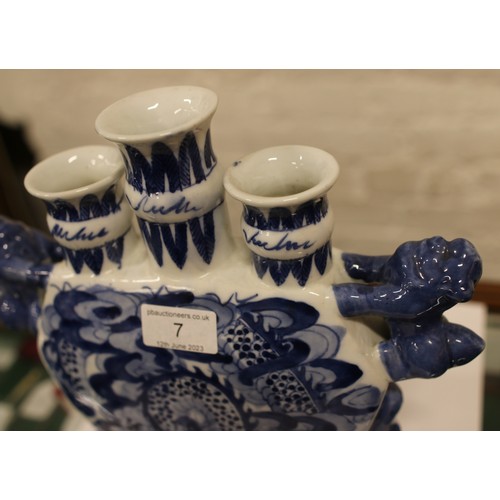 7 - A collection of blue and white ceramics to include tulip vase and pair of baluster lidded vase beari... 