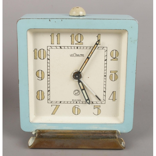 112 - A Jaeger LeCoultre Alarm Clock, with square blue dial and Arabic numerals (6.5cm high), together wit... 