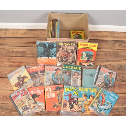 436 - A box of Western annuals. Include Rawhide, Bonanza, Western Film, Billy the Kid, etc.