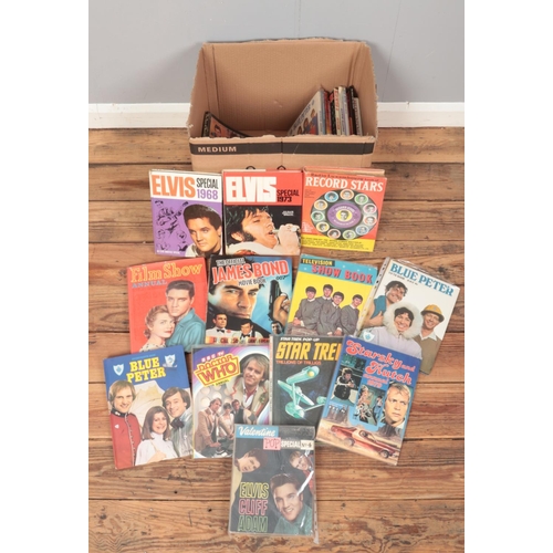 437 - A box of music and TV annuals. Includes Star Trek, Thunderbirds, Blue Peter, Television Show Book, J... 