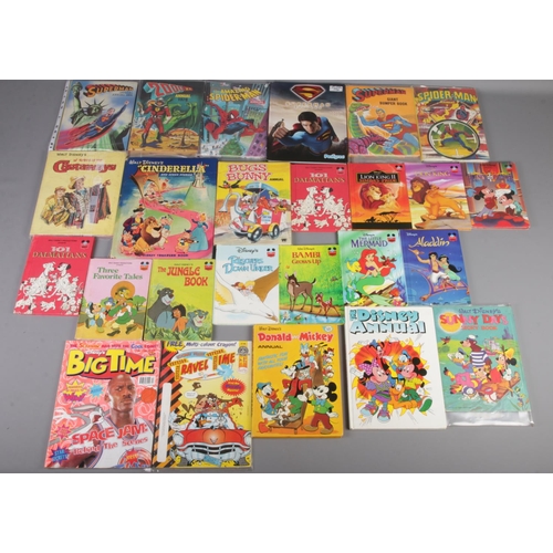 440 - A quantity of Superhero and Disney books and annuals. Includes The Amazing Spiderman, Superman, Cind... 