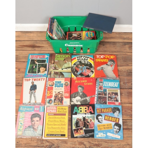 449 - A box of music annuals. Includes Top Pop Stars, ABBA, Top of the Pops, etc.