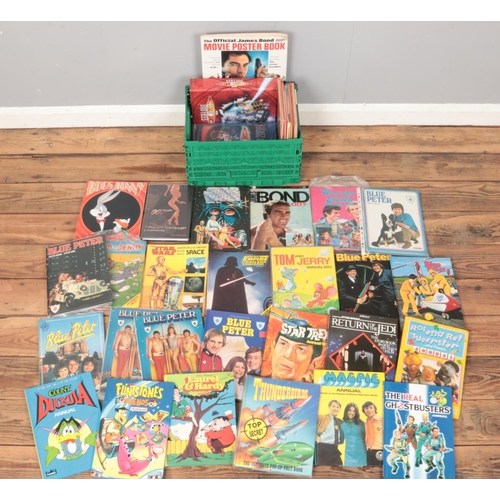 450 - A box of TV show and super hero annuals. Includes Star Trek, Thunderbirds, Blue Peter, Star Wars, Su... 