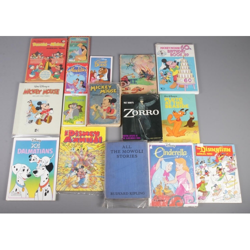 458 - A collection of Disney books and annuals. Includes 1946 Dean Mickey Mouse annual, etc.