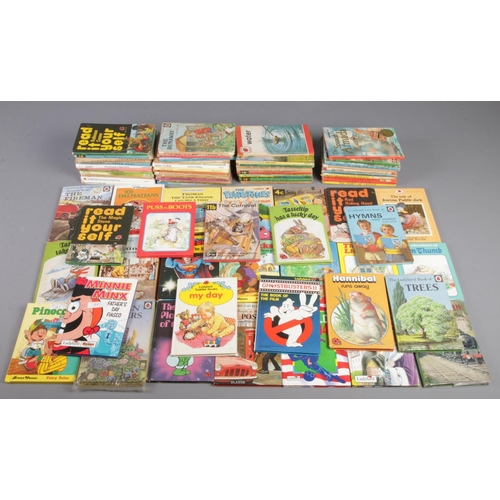 471 - A box of mostly vintage Ladybird books. Includes The Flintstones, 101 Dalmatians, Paddington Carniva... 