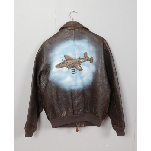 226 - A reproduction Avirex Type A-2 US Air Force leather bomber jacket decorated with military aircraft t... 