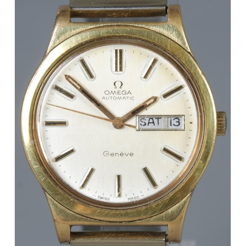 263 - A gentleman's Omega Geneve automatic wristwatch with day date display and expanding strap. Mechanism... 