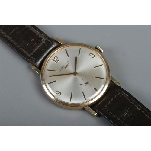 264 - A Gents 9ct Gold Longines manual wristwatch, with quarterly numeral and baton markers, with subsidia... 