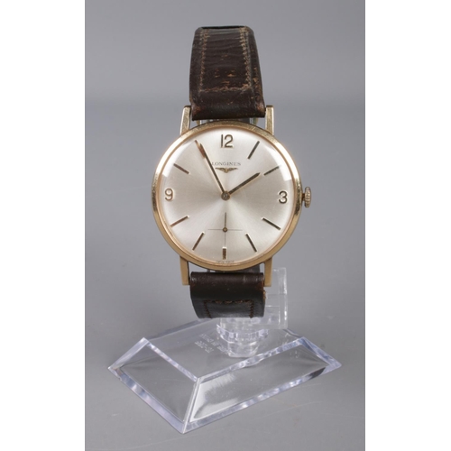 264 - A Gents 9ct Gold Longines manual wristwatch, with quarterly numeral and baton markers, with subsidia... 