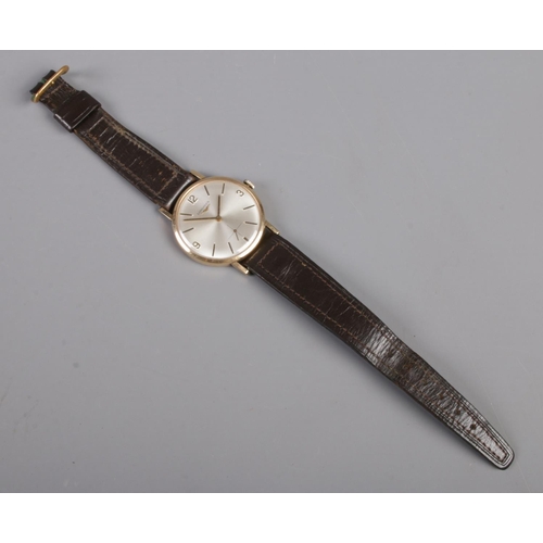 264 - A Gents 9ct Gold Longines manual wristwatch, with quarterly numeral and baton markers, with subsidia... 