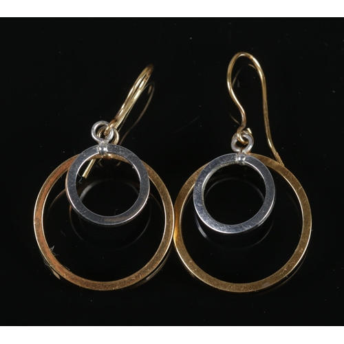 286 - A pair of 9ct yellow and white gold double hoop earrings, 2 grams.