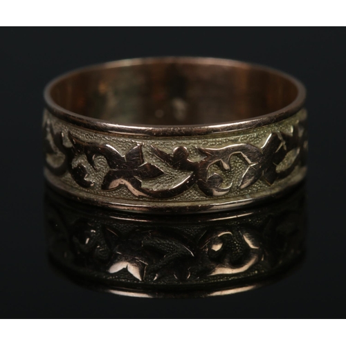 309 - An antique 9ct Gold leaf scroll band, with initials JMW to outer and 'Mary' to the interior of the b... 