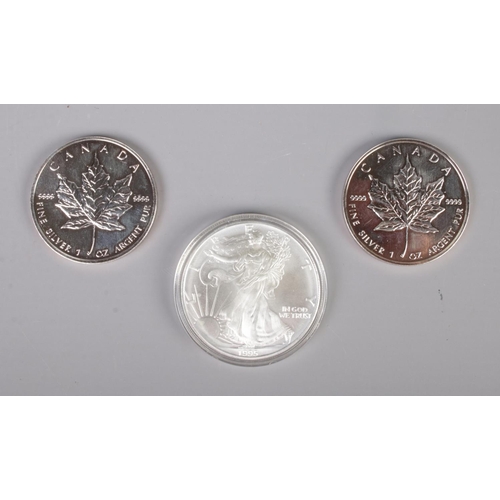 314 - A 1994 and 1995 Canada fine silver 1oz. 5 dollars maple coin along with United State Of America 1oz.... 