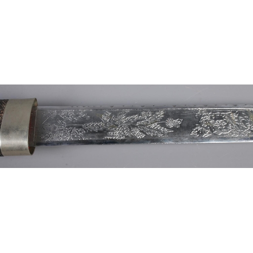 361 - A replica Scottish Dirk dagger featuring engraved thistle decoration to blade and white metal crown ... 