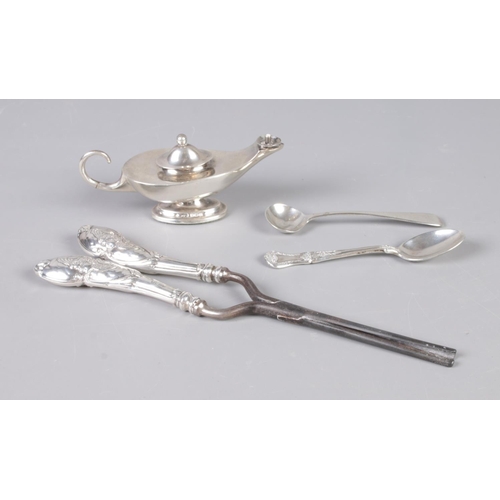 379 - A collection of silver to include lamp style table lighter, spoons and pair of silver handled glove ... 