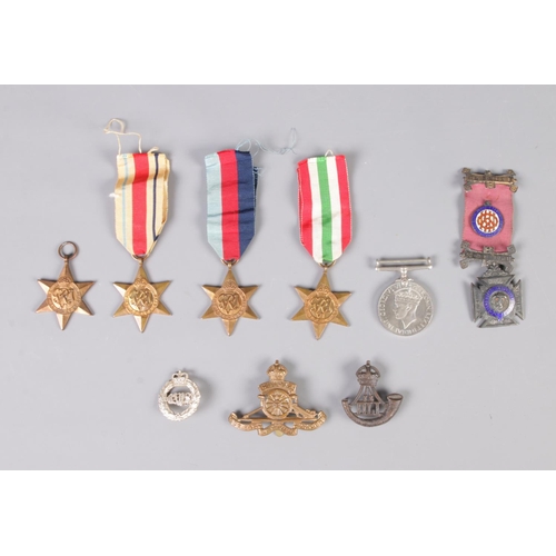 380 - A collection of medals including the Italy star medal, the Africa star medal, a pair of the 1939 -19... 