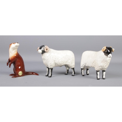 383 - Three boxed Beswick figures including otter and Limited Edition Swaledale Ram (146/1000) and Ewe (32... 