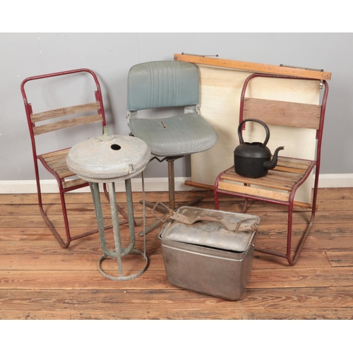 412 - A mixed metal industrial style lot including two metal chairs and a folding industrial style pedesta... 